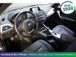 BMW 1-serie - 114i | Geen import | Leer | Navi - 1 - Thumbnail