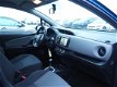 Toyota Yaris - 1.3 VVT-i 99pk 5D Aut Aspiration/NAVIGATIE - 1 - Thumbnail