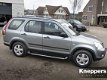 Honda CR-V - 2.0 150pk 4WD Automaat | LS | Parkeersensoren - 1 - Thumbnail