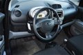 Daihatsu Sirion 2 - 1.3-16V Prestige *Airco*Trekhaak*Lichtmetalen Velgen - 1 - Thumbnail