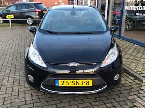 Ford Fiesta - 1.25 82PK Titanium X-pack Navigatie | Cruise | Clima | Trekhaak | All-season banden | - 1