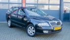 Skoda Octavia Combi - 1.6 Ambiente - 1 - Thumbnail