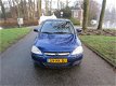 Opel Corsa - 1.4-16V Full Rhythm airco.elelectr.ramen.stuurbekr.deurvergrendelng.lm.wielen - 1 - Thumbnail