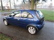 Opel Corsa - 1.4-16V Full Rhythm airco.elelectr.ramen.stuurbekr.deurvergrendelng.lm.wielen - 1 - Thumbnail