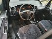 Opel Zafira - 1.6-16V Comfort - ZWART - 7 PERSOONS - 1 - Thumbnail