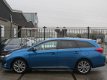 Toyota Auris Touring Sports - 1.8 Hybrid Lease+ LEER/ PANORAMA/ XENON/ KEYLESS - 1 - Thumbnail