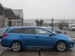 Toyota Auris Touring Sports - 1.8 Hybrid Lease+ LEER/ PANORAMA/ XENON/ KEYLESS - 1 - Thumbnail