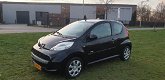 Peugeot 107 - 1.0-12V Millesim 200 Dealer onderhouden 1e eigenaar airco cv op afs elekramen stuurbkr - 1 - Thumbnail