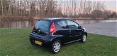 Peugeot 107 - 1.0-12V Millesim 200 Dealer onderhouden 1e eigenaar airco cv op afs elekramen stuurbkr - 1 - Thumbnail