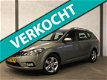 Kia Cee'd Sporty Wagon - 1.4 CVVT Navigator Plus Pack Camera, Clima, Cruise, Dealer Onderhouden - 1 - Thumbnail