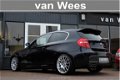 BMW 1-serie - 130i E81 High Executive Sport | M-pakket | Automaat | 266 pk | - 1 - Thumbnail