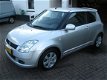 Suzuki Swift - 1.3 Bandit /Super auto, Keyless en Airco - 1 - Thumbnail