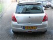 Suzuki Swift - 1.3 Bandit /Super auto, Keyless en Airco - 1 - Thumbnail