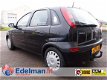 Opel Corsa - 1.2-16V Njoy ( 5 deurs, APK 11-2020 ) - 1 - Thumbnail