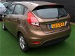 Ford Fiesta - 1.5 TDCi Titanium UNIEK, leer 1e eigenaar - 1 - Thumbnail