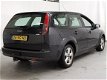 Ford Focus Wagon - 1.6 TDCI Futura ✅NAP, NAVI, PDC, STOELVERW, TREKHAAK, CRUISE, AIRCO, APK 23-10-20 - 1 - Thumbnail