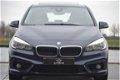 BMW 2-serie Active Tourer - 218i Essential AUTOMAAT | NAVIGATIE | PANORAMADAK | CLIMA | PDC | TREKHA - 1 - Thumbnail