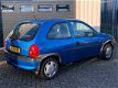 Opel Corsa - 1.2i-16V Strada - 1 - Thumbnail