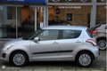 Suzuki Swift - 1.2 Comfort EASSS, Afneembare trekhaak - 1 - Thumbnail