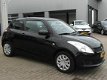 Suzuki Swift - 1.2 Comfort - Airco - Elektr. ramen - Radiobed. stuur - 1 - Thumbnail