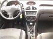 Peugeot 206 - XS zeer lux.s/airco/elektrispakket. 1.4 motor - 1 - Thumbnail