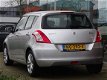 Suzuki Swift - 1.2 Exclusive EASSS Navigatie Schuifdak Camera PDC - 1 - Thumbnail