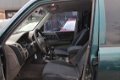 Mitsubishi Pajero - 3.2 Di-D GLX LB *GRIJS KENTEKEN - 1 - Thumbnail