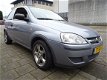 Opel Corsa - 1.2-16V RHYTHM TWINPOORT - 1 - Thumbnail