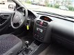 Opel Corsa - 1.2-16V RHYTHM TWINPOORT - 1 - Thumbnail