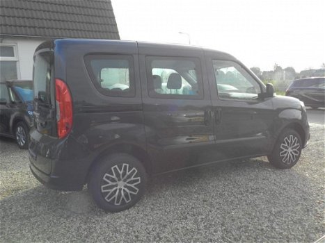 Opel Combo - 5 Persoon geel kenteken Navigatie , cruisecontrole , airco , - 1