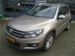 Volkswagen Tiguan - 1.4 TSI 160 pk Sport&Style Trekhaak | Navigatie | Leder - 1 - Thumbnail