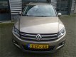 Volkswagen Tiguan - 1.4 TSI 160 pk Sport&Style Trekhaak | Navigatie | Leder - 1 - Thumbnail