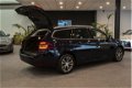 Peugeot 308 SW - 1.2 PureTech Blue Lease Premium *ACTIE* | NAVI | AIRCO | CRUISE | - 1 - Thumbnail