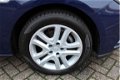 Opel Astra Sports Tourer - 1.0 Turbo 105pk Online Edition Navi 900 Camera - 1 - Thumbnail