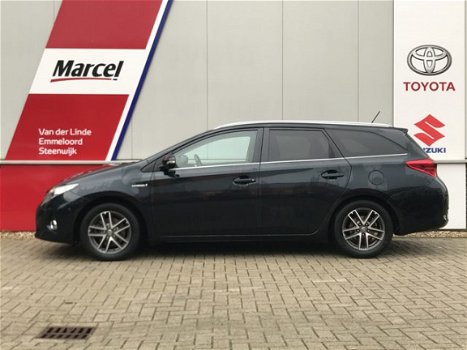 Toyota Auris Touring Sports - 1.8 Hybrid Lease Pano Navi Cruise trekhaak PDC Xenon - 1