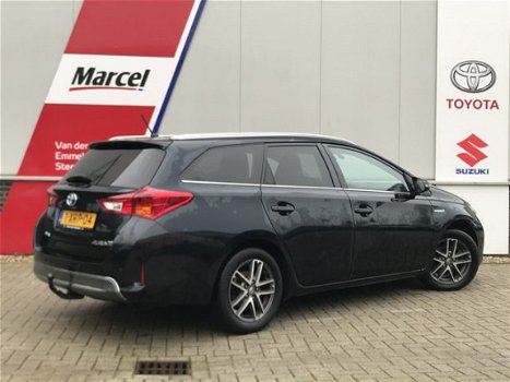 Toyota Auris Touring Sports - 1.8 Hybrid Lease Pano Navi Cruise trekhaak PDC Xenon - 1