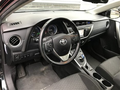 Toyota Auris Touring Sports - 1.8 Hybrid Lease Pano Navi Cruise trekhaak PDC Xenon - 1