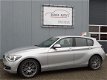 BMW 1-serie - 116i EDE High Executive Navigatie/18inch/Leer/Climate - 1 - Thumbnail