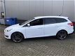 Ford Focus Wagon - 1.0 TITANIUM XENON / NAVI / AF.TREKHAAK / RIJKLAAR / BOVAG - 1 - Thumbnail