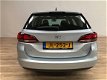 Opel Astra Sports Tourer - 1.0 Turbo Edition OPEN DAK / NAVI / PDC V+A / CLIMA / LMV / LED DAGRIJVER - 1 - Thumbnail