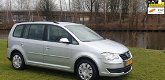 Volkswagen Touran - 1.4 TSI Comfortline Business Lage km slecht 124100 nap Airco navi airco cruis co - 1 - Thumbnail