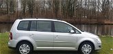 Volkswagen Touran - 1.4 TSI Comfortline Business Lage km slecht 124100 nap Airco navi airco cruis co - 1 - Thumbnail