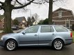 Skoda Octavia Combi - 1.6 AMBIENTE, AUTOMAAT, TREKHAAK, AIRCO, CRUISE CONTROL, ETC - 1 - Thumbnail