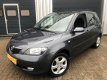 Mazda 2 - 2 1.4 Première LEUKE DEALERONDERHOUDENMET AIRCO EN APK - 1 - Thumbnail