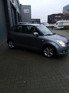 Suzuki Swift - 1.3 Exclusive 93039 km Leer