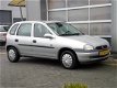 Opel Corsa - 1.2i-16V Strada 5 Deurs 189.000km - 1 - Thumbnail