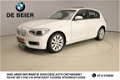 BMW 1-serie - 116D Xenon / Navigatie / Schuifdak / Keyless go / Clima / PDC / Alu 17 inch - 1 - Thumbnail