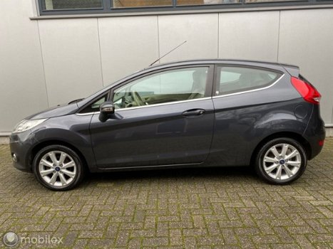 Ford Fiesta - 1.25 Ghia 82PK ElekPakket Stoelverwarming - 1