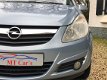 Opel Corsa - 1.4-16V Cosmo /Airco/Navi/Cruise Nap/Weinig Km - 1 - Thumbnail