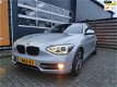 BMW 1-serie - 116d EDE Executive 5-deurs met Xenon, Navigatie, Climate & Cruise control, PDC, etc - 1 - Thumbnail